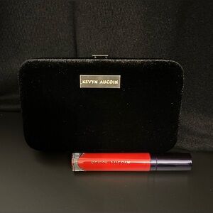 New Kevyn Aucoin Velvet Lipstick in *Stunning* Red with black velvet clutch